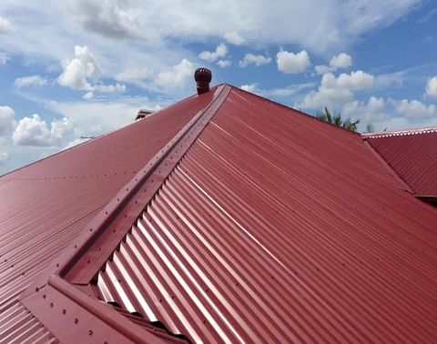Red corrugated roof, freshly finished